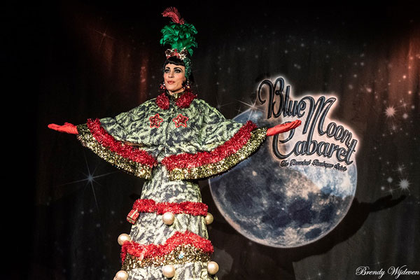christmas tree burlesqueact with Mama Ulita performing at the Blue Moon Cabaret - The Decadent Burlesque Soiree by Boudoir Noir Production, Finest Vintage Entertainment!